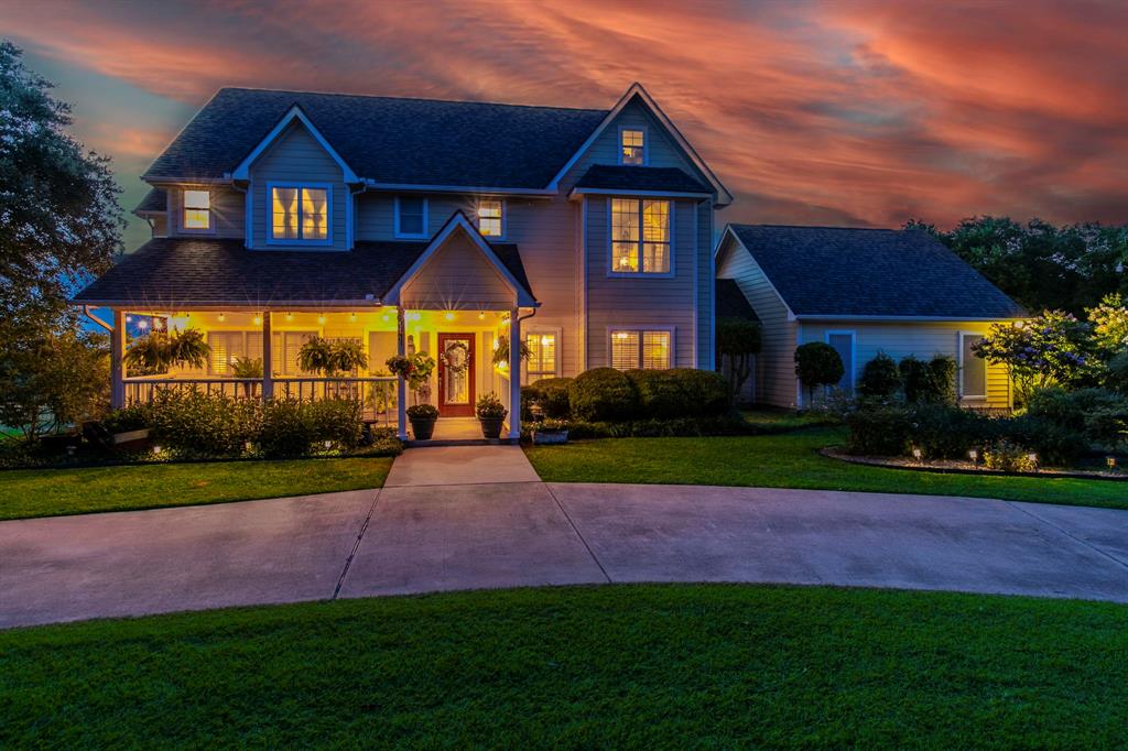 Stunning home, lit up at sunset. This is the good life...