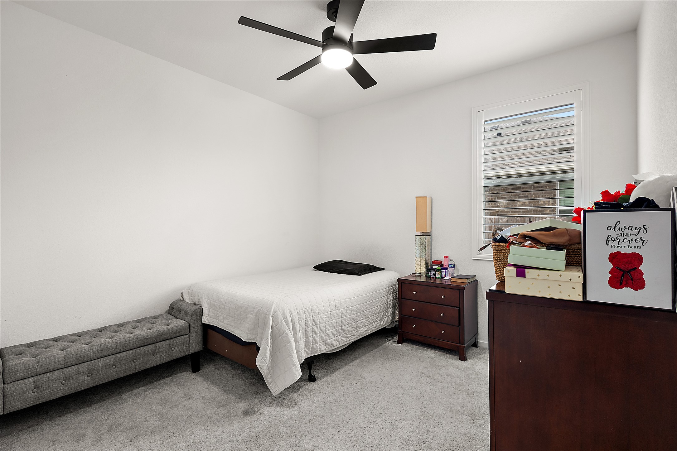3414 Eden Vly Lane Rosenberg, TX 77471 - Photo 13 of 24 a bedroom with a bed and a dresser