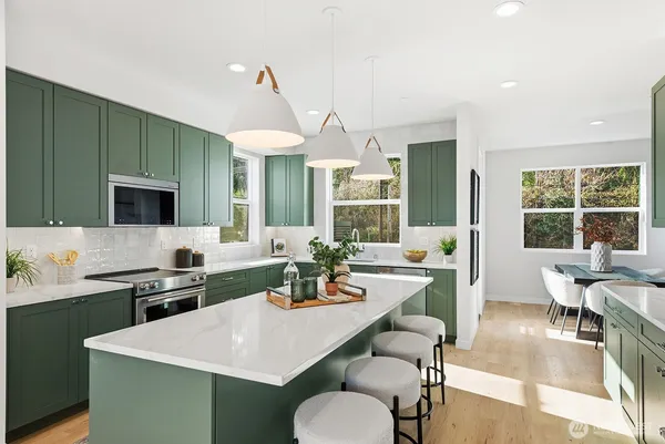 a view of kitchen with sink living room and living room