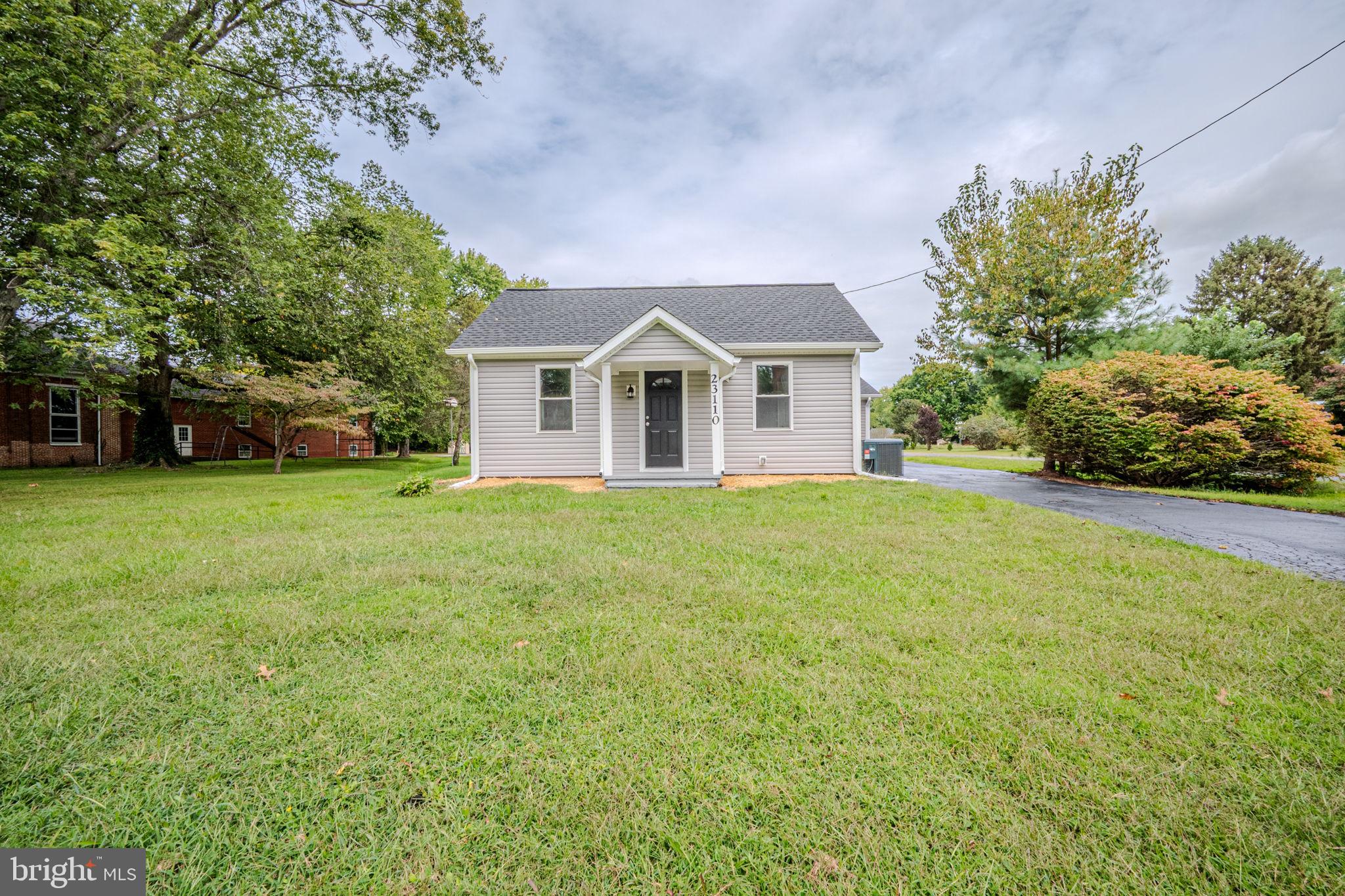23110 Old Fairlee Road Chestertown, MD 21620 - Photo 26 of 29 a front view of house with yard and green space