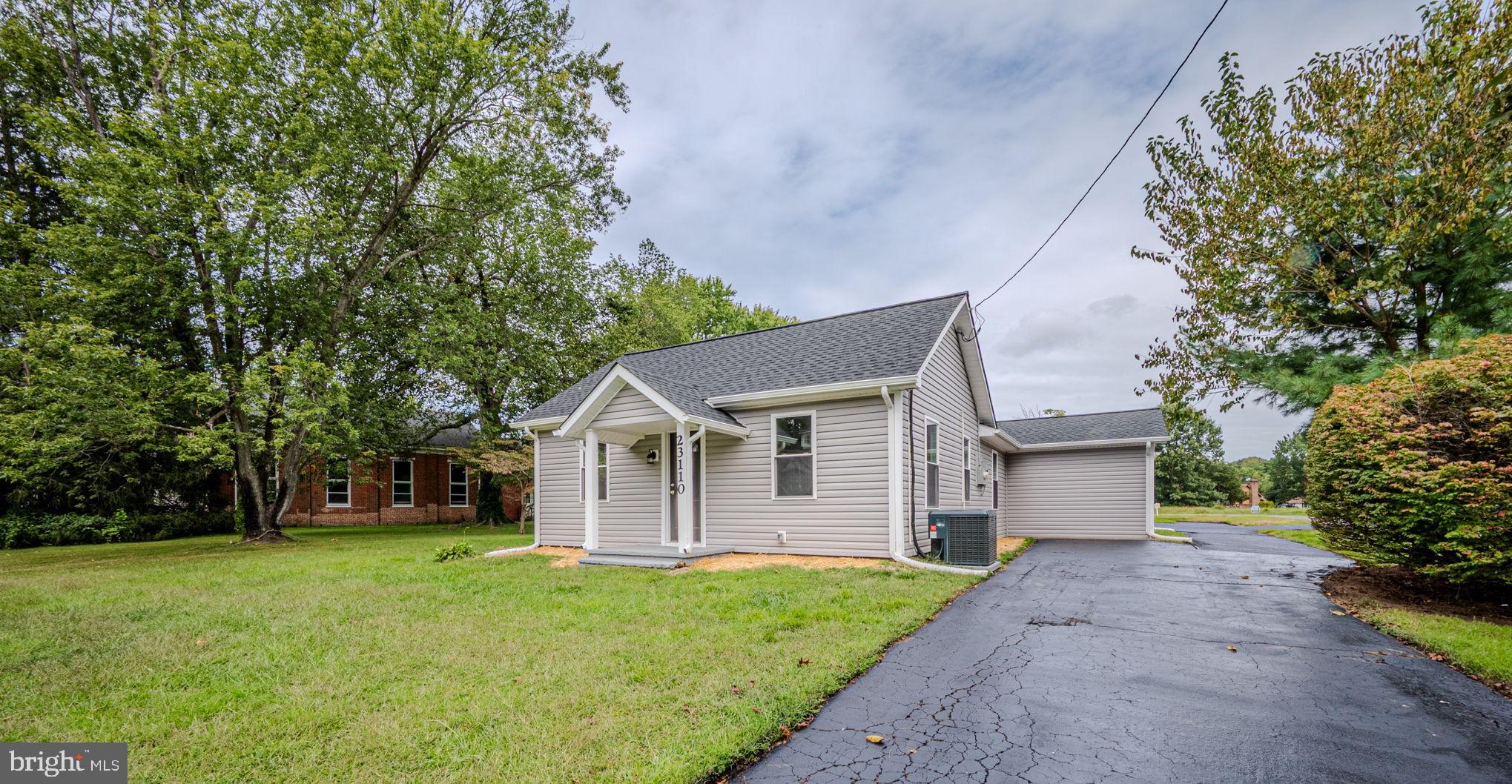 23110 Old Fairlee Road Chestertown, MD 21620 - Photo 27 of 29 front view of a house with a yard