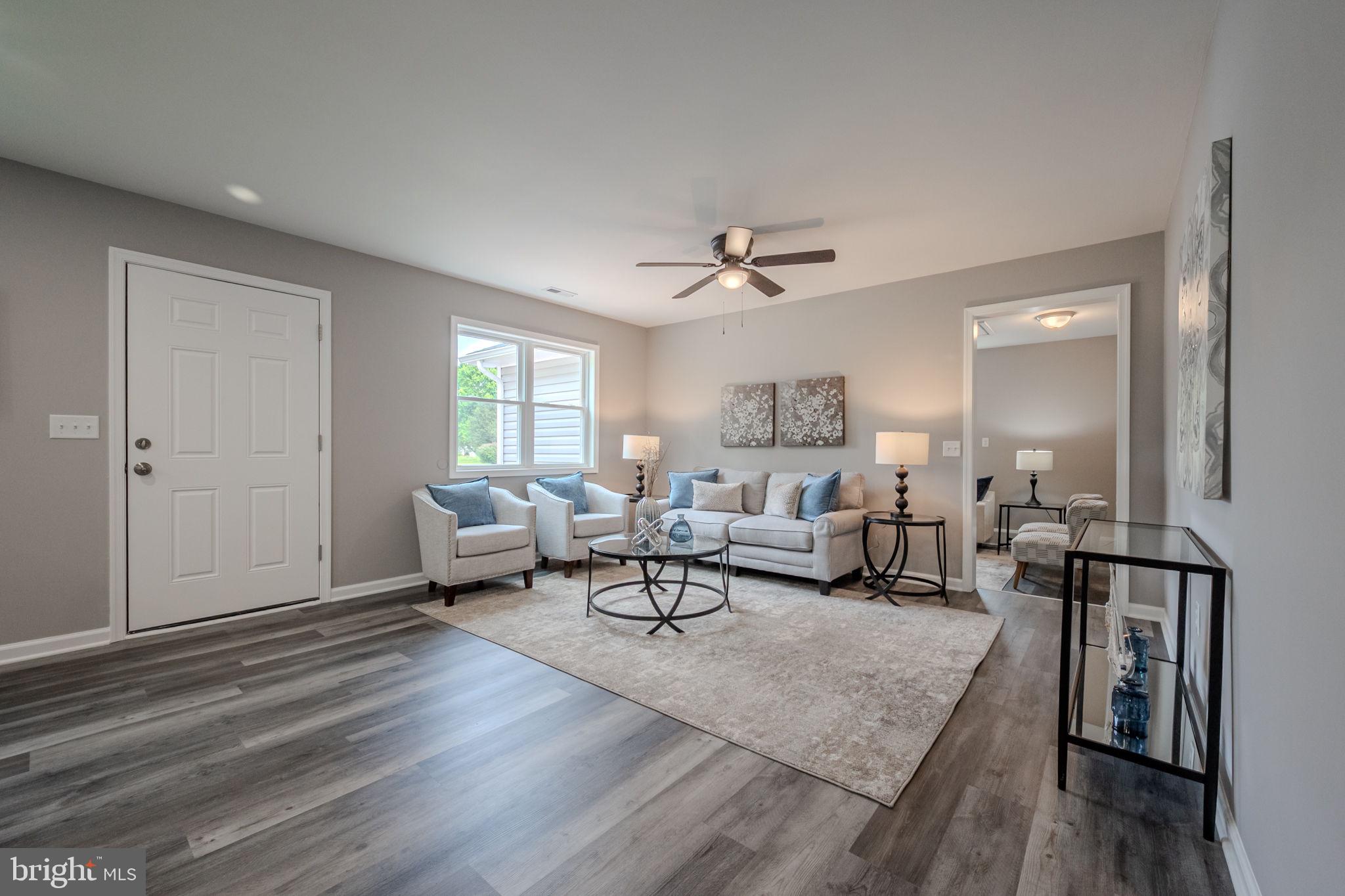 23110 Old Fairlee Road Chestertown, MD 21620 - Photo 3 of 29 a living room with furniture and wooden floor