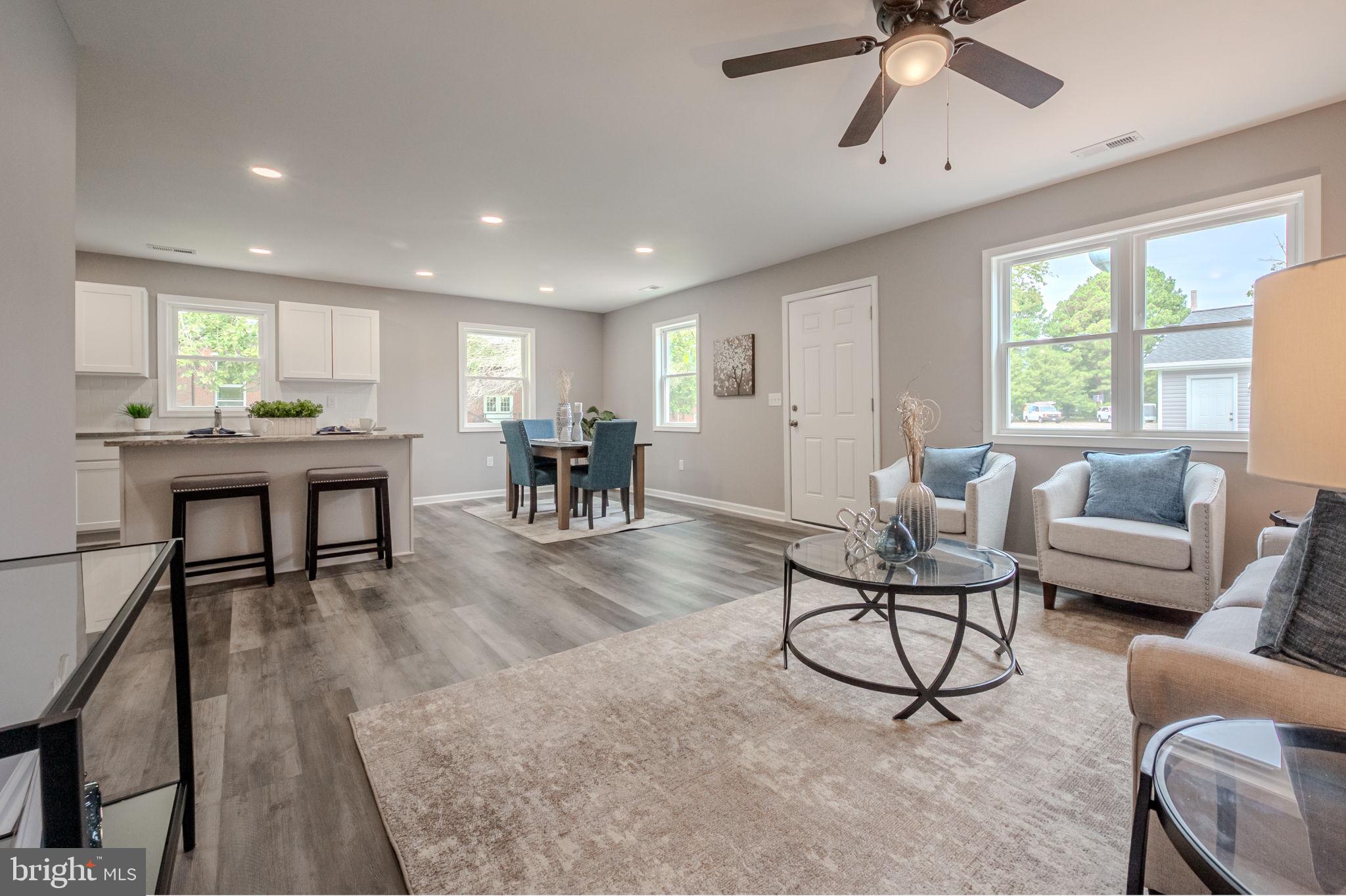 23110 Old Fairlee Road Chestertown, MD 21620 - Photo 5 of 29 a living room with furniture and a large window