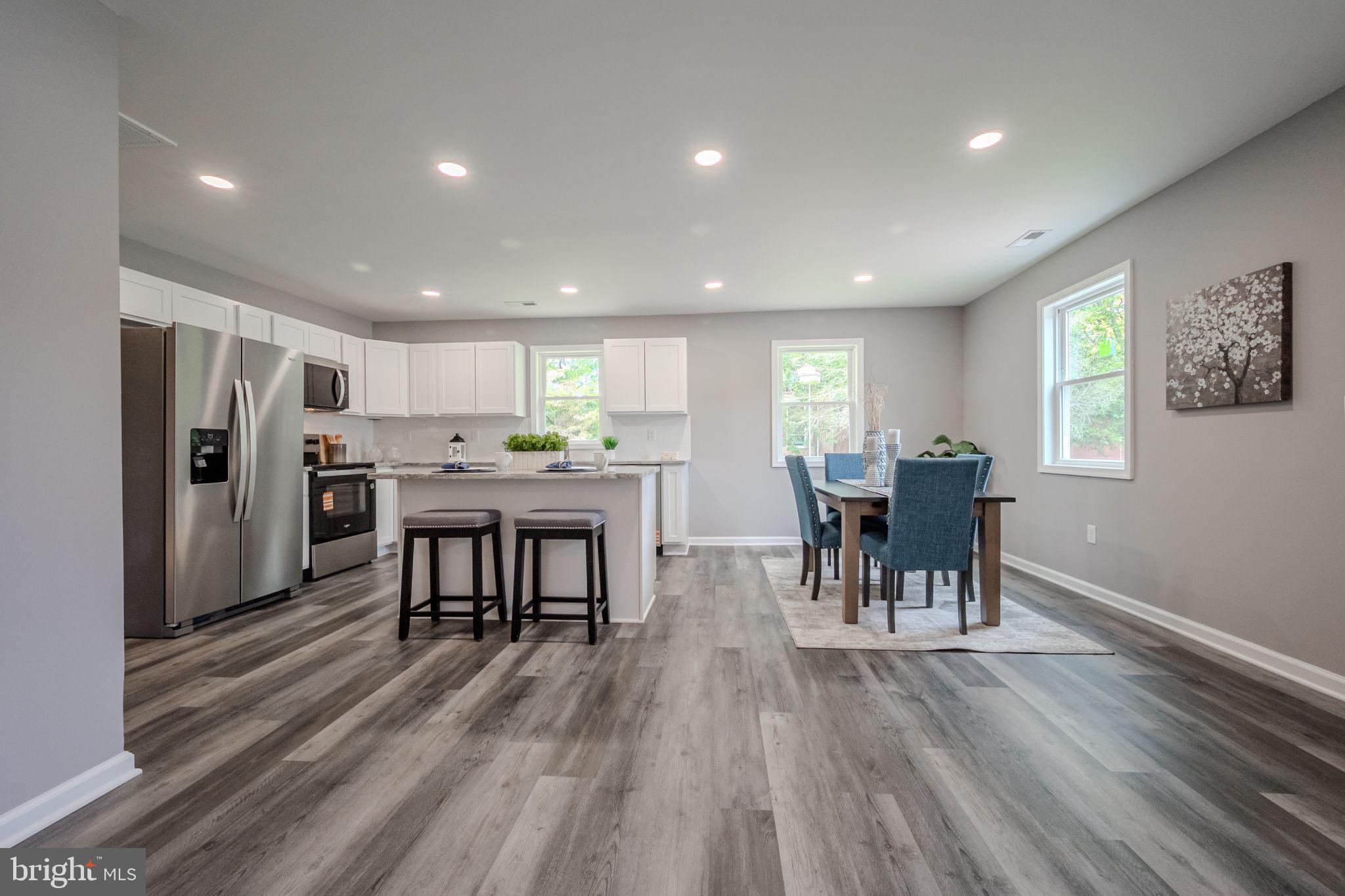 23110 Old Fairlee Road Chestertown, MD 21620 - Photo 6 of 29 a kitchen with a table and chairs in it