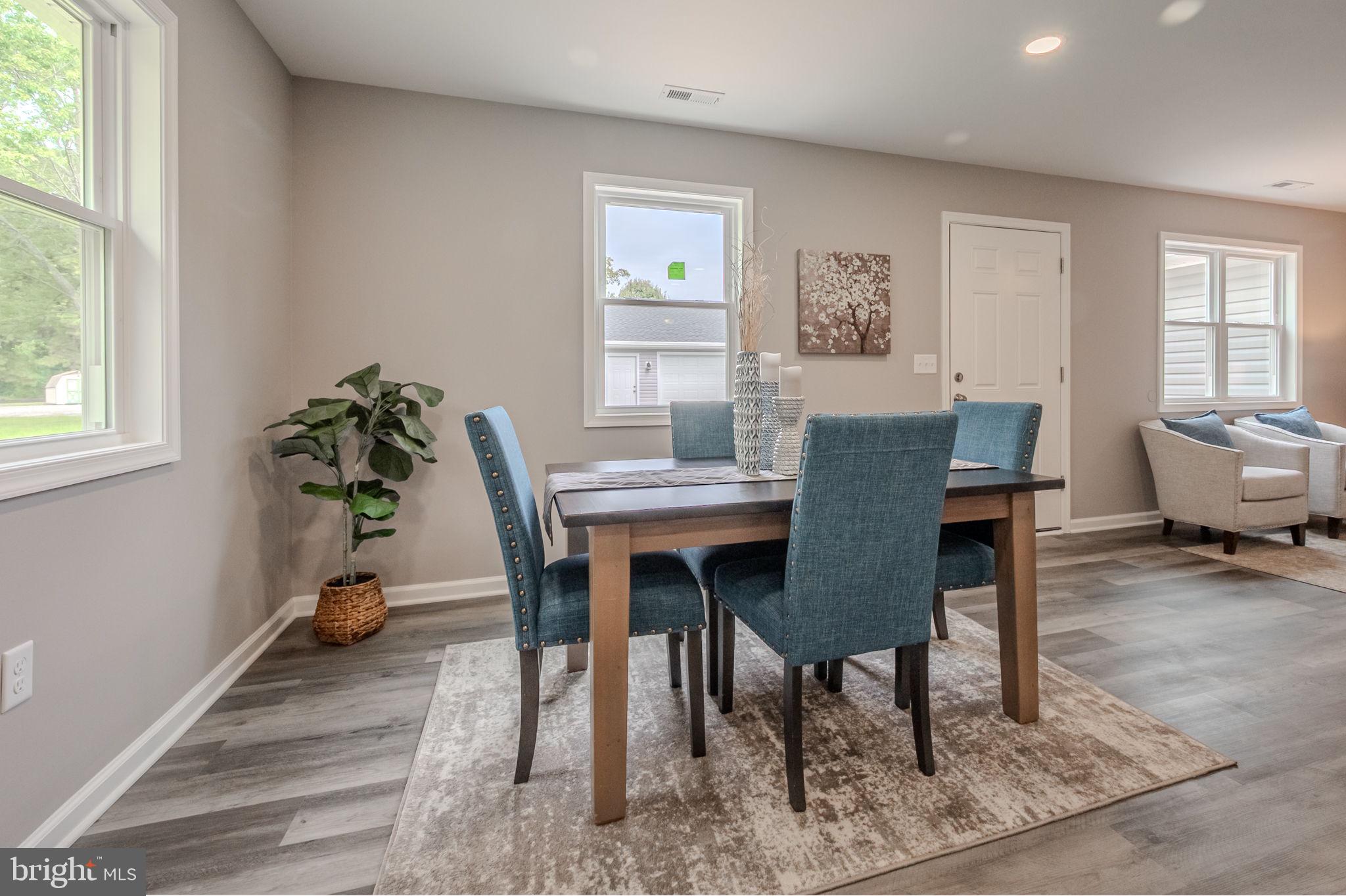 23110 Old Fairlee Road Chestertown, MD 21620 - Photo 7 of 29 a dining room with furniture and window