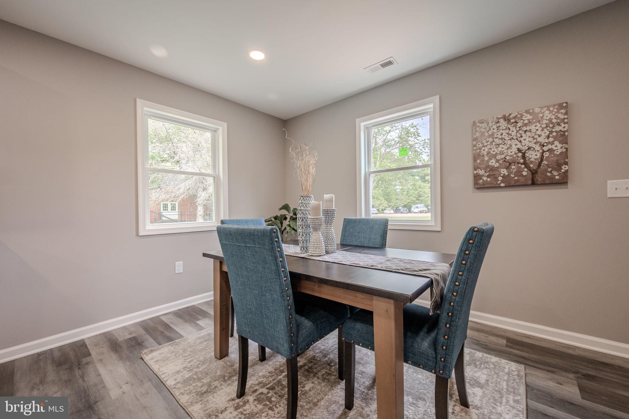 23110 Old Fairlee Road Chestertown, MD 21620 - Photo 8 of 29 a view of a dining room with furniture window and wooden floor