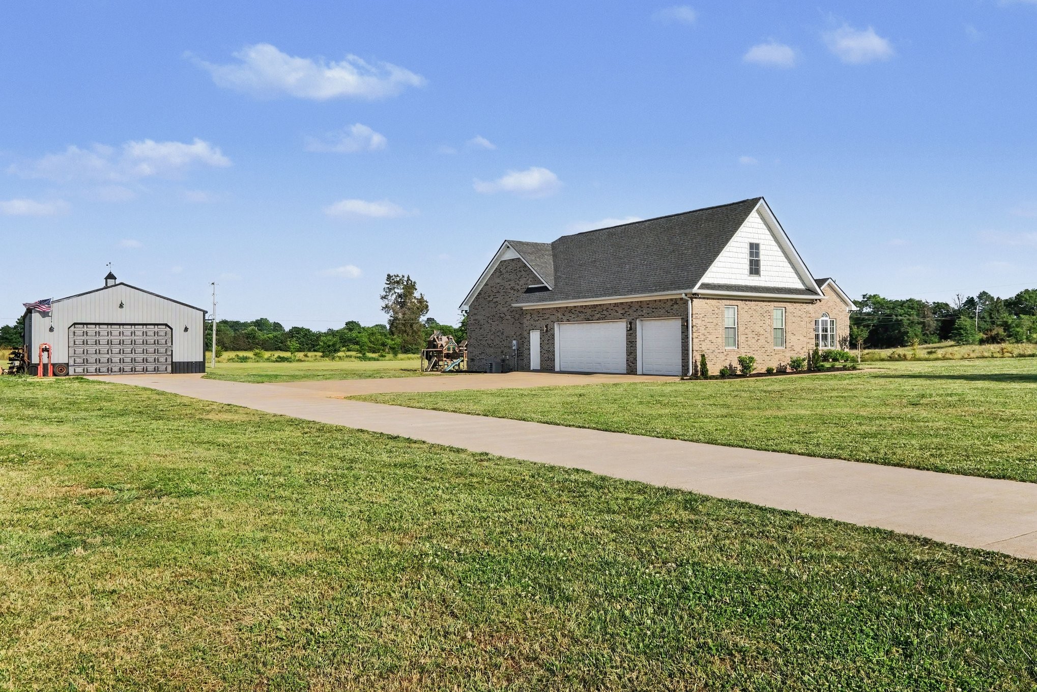 2829 Anes Station Road Lewisburg, TN 37091 - Photo 38 of 43 a front view of a house with a yard