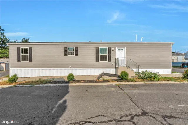 a view of backyard of a house
