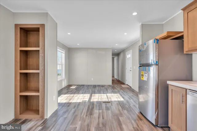 a view of a kitchen from the hallway