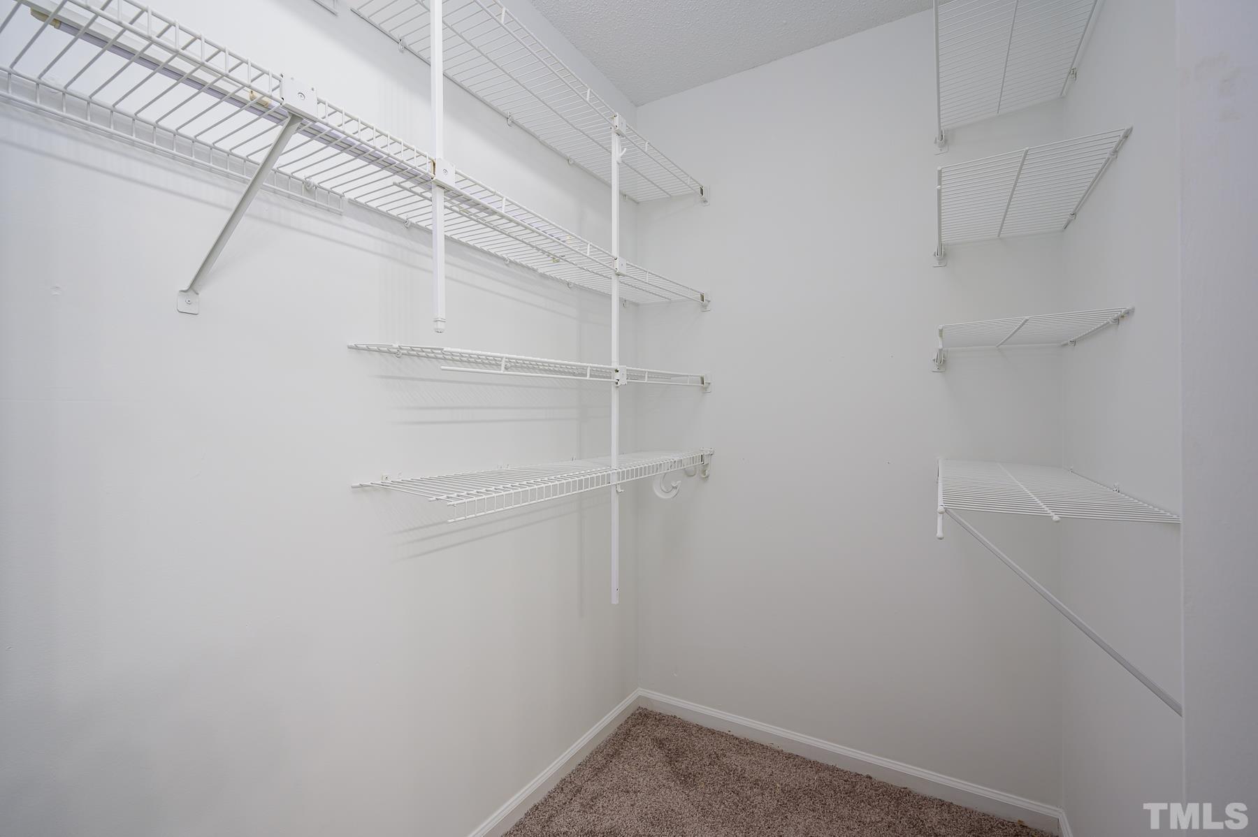 2812 Fenham Court Raleigh, NC 27604 - Photo 14 of 20 a view of an empty walk in closet