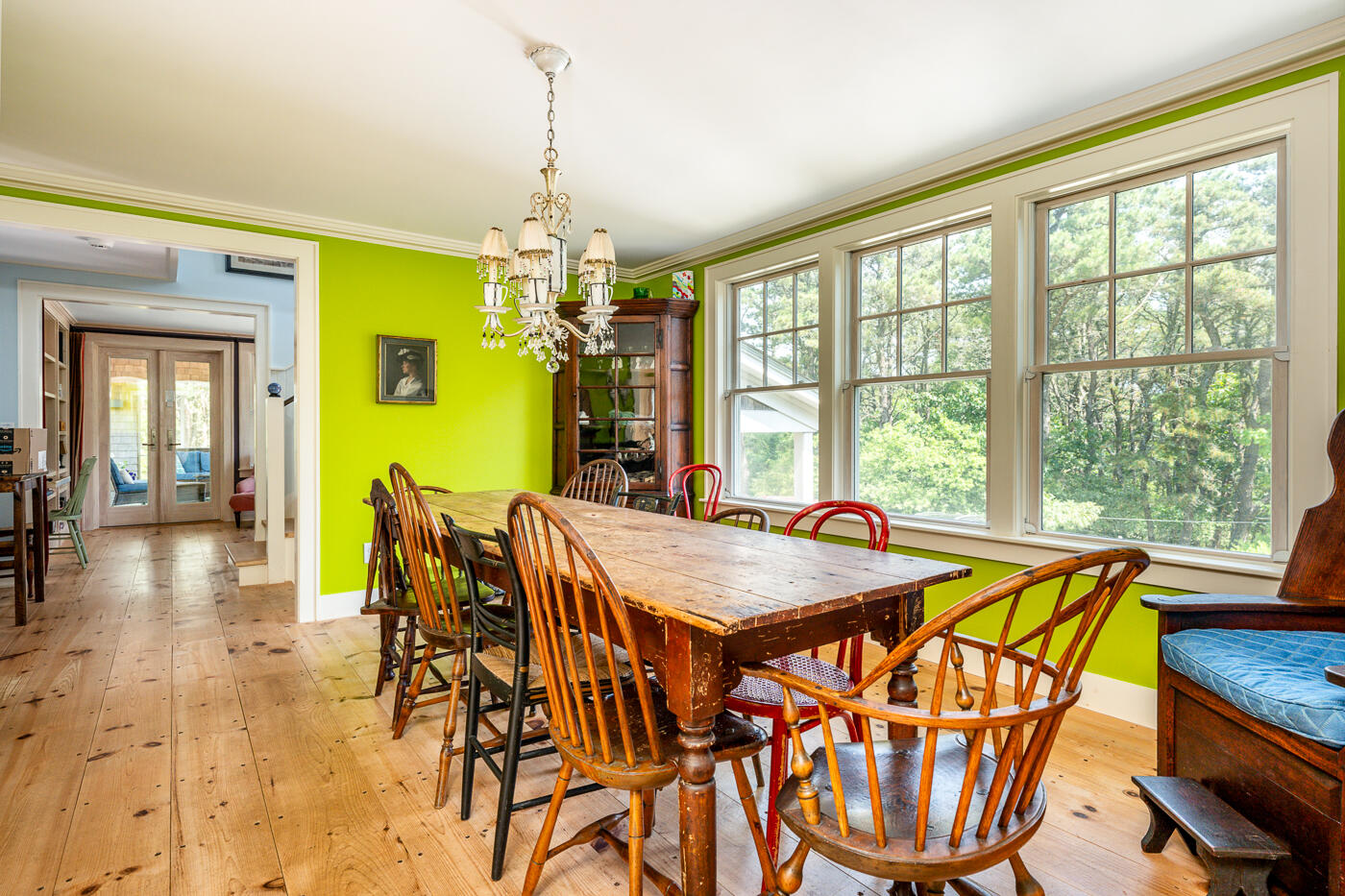 9 Towhee Lane Truro, MA 02666 - Photo 21 of 62 a dining room with furniture a chandelier and wooden floor