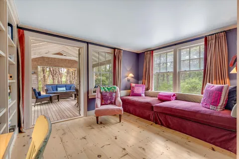 a bedroom with a bed and a closet