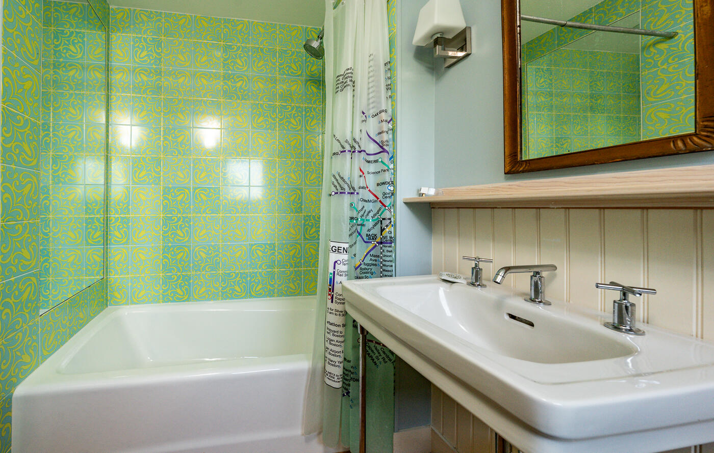 9 Towhee Lane Truro, MA 02666 - Photo 41 of 62 a bathroom with a sink and a bathtub