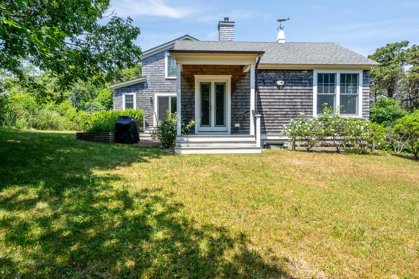 9 Towhee Lane Truro, MA 02666 - Photo 52 of 62 a front view of a house with garden