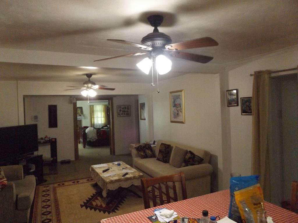707 Ruby Street Jackson, SC 29831 - Photo 13 of 35 a living room with furniture and a chandelier