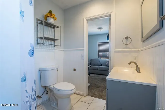 a view of a bathroom from the hallway