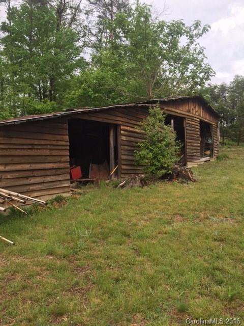 4665 Highway 9 Mill Spring, NC 28756 - Photo 11 of 12 a view of a backyard with sitting area