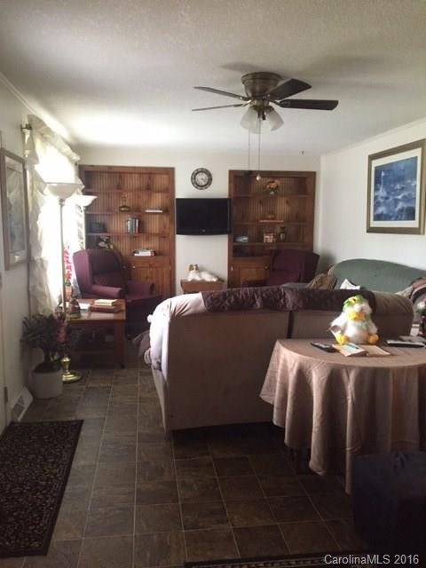 4665 Highway 9 Mill Spring, NC 28756 - Photo 4 of 12 a bathroom with a sink and mirror