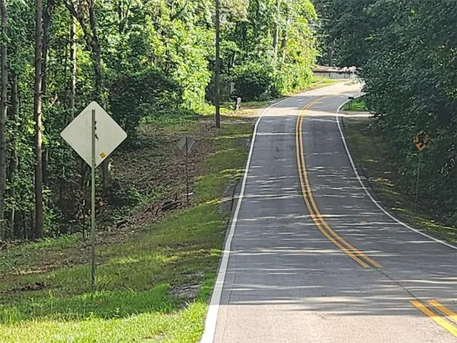 a view of a backyard with a deck