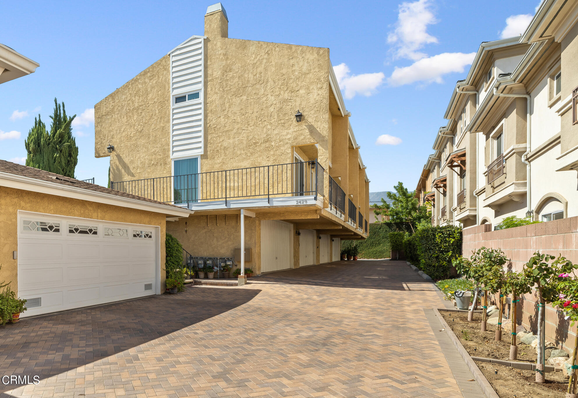 a view of a building with a street