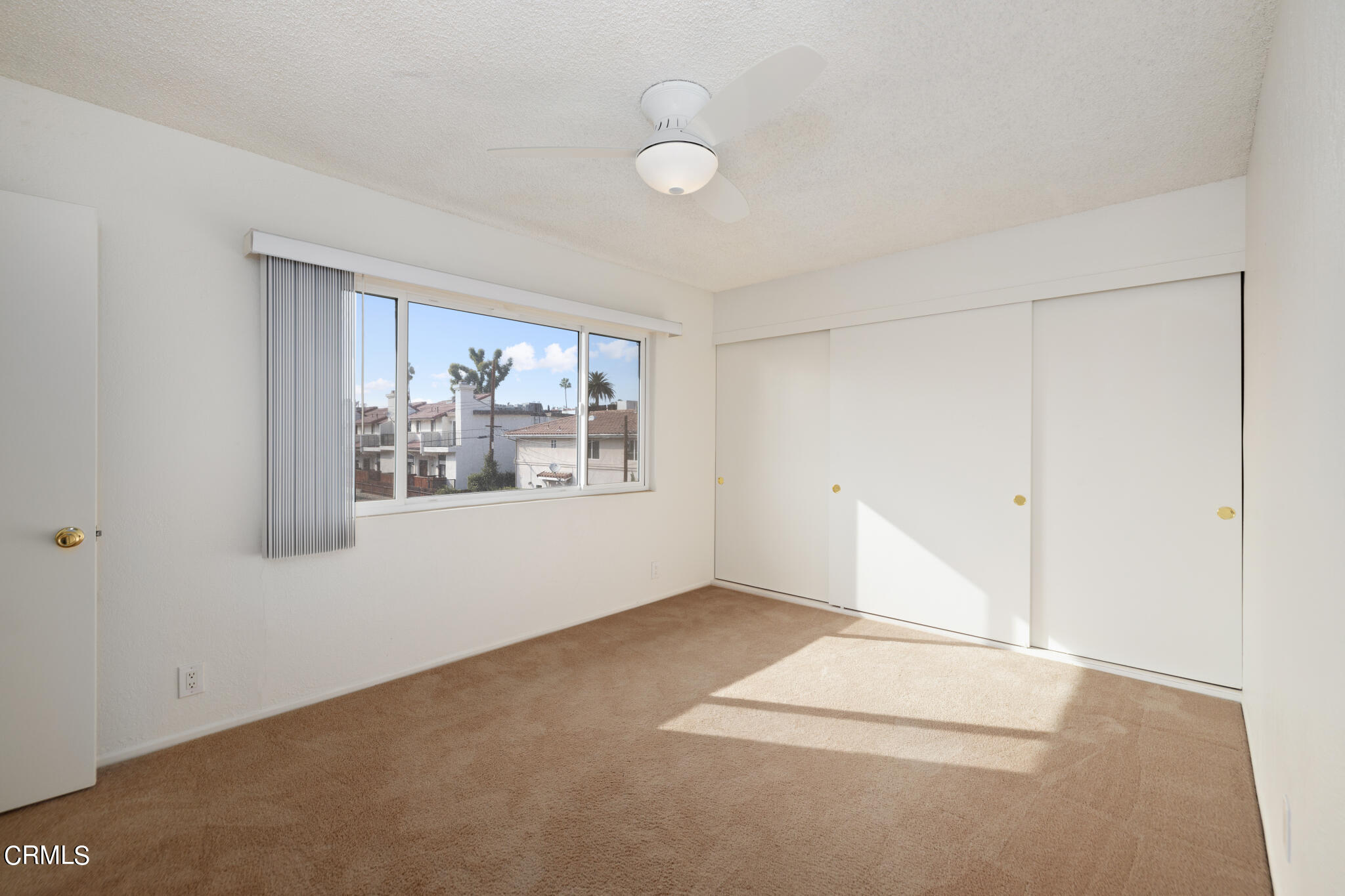 2429 Oswego Street, Unit B Pasadena, CA 91107 - Photo 18 of 25 an empty room with windows and painted walls
