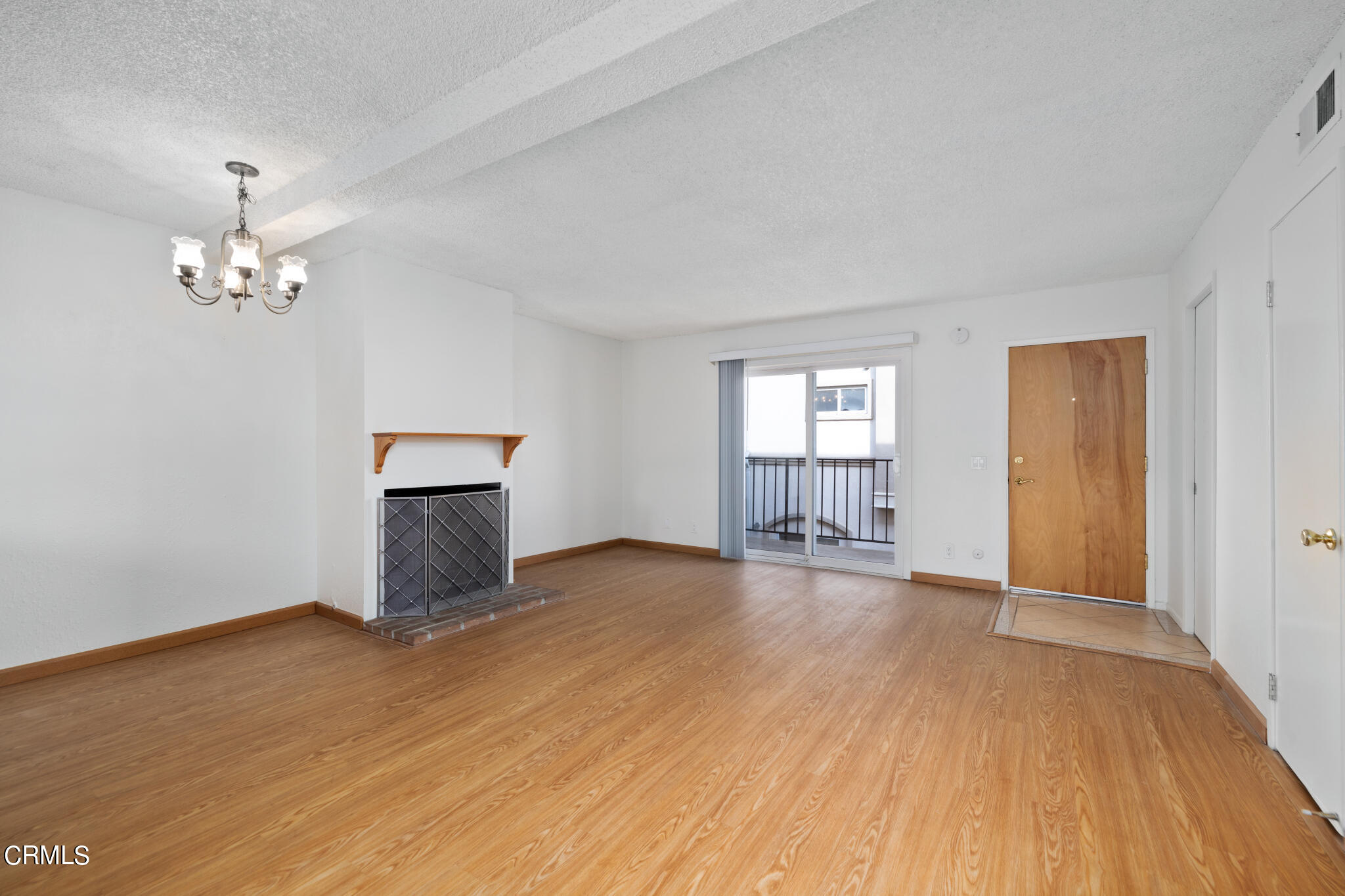 2429 Oswego Street, Unit B Pasadena, CA 91107 - Photo 7 of 25 a view of empty room with wooden floor and fan
