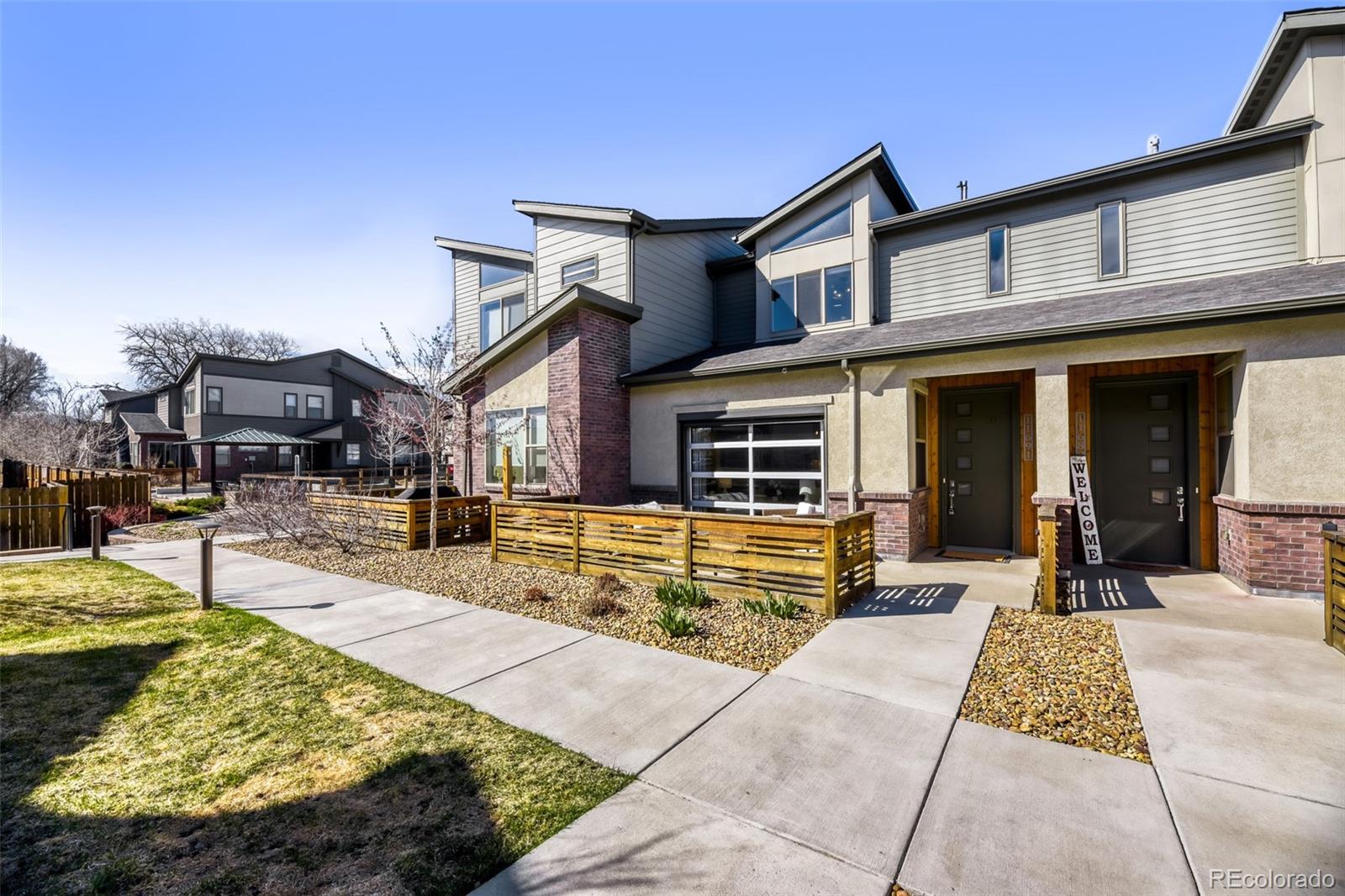 11691 West 45th Place Wheat Ridge, CO 80033 - Photo 27 of 30 a view of a house with sitting area