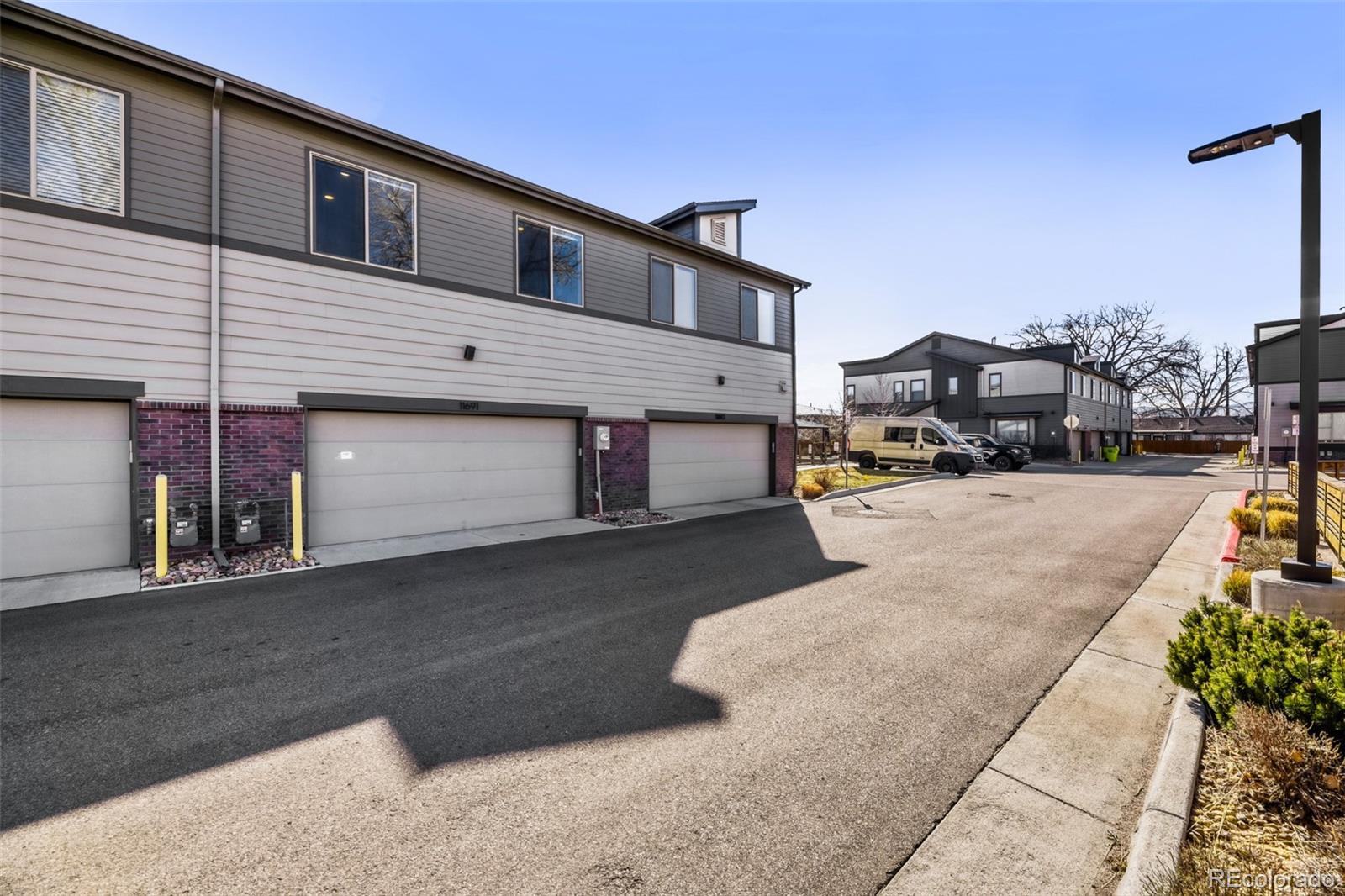 11691 West 45th Place Wheat Ridge, CO 80033 - Photo 28 of 30 a view of a house with a street
