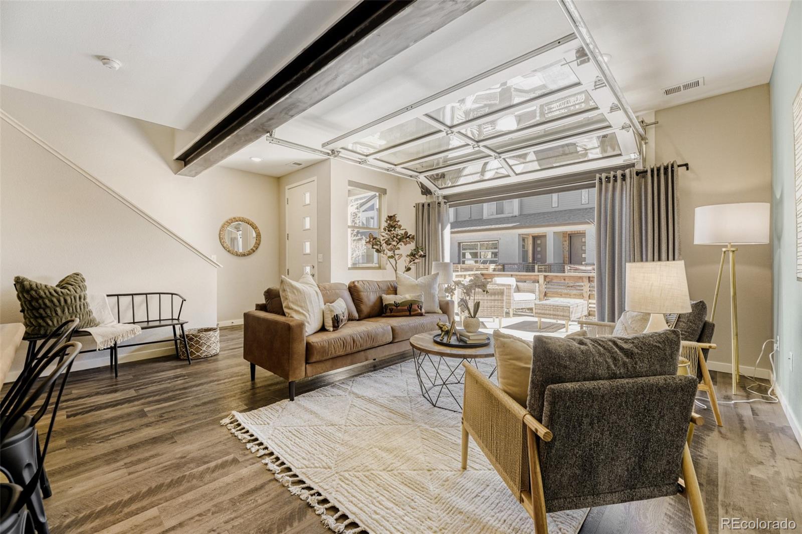 11691 West 45th Place Wheat Ridge, CO 80033 - Photo 7 of 30 a living room with furniture and a large window