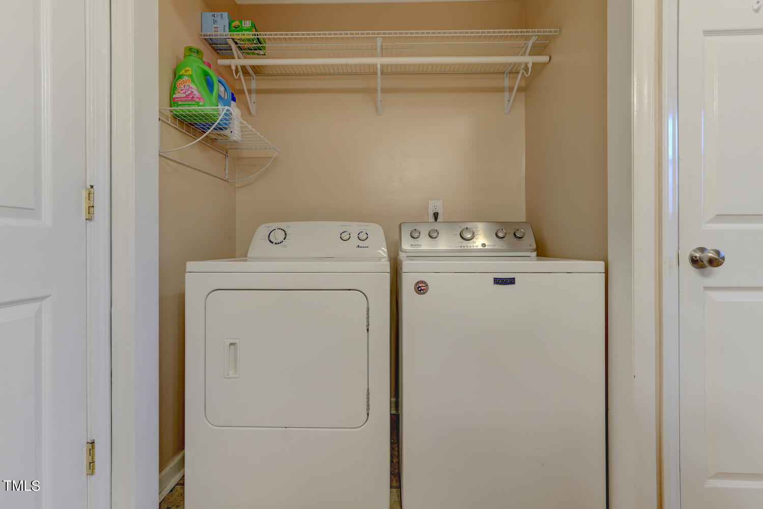 650 Huffines Mill Road Reidsville, NC 27320 - Photo 24 of 35 a utility room with dryer and washer