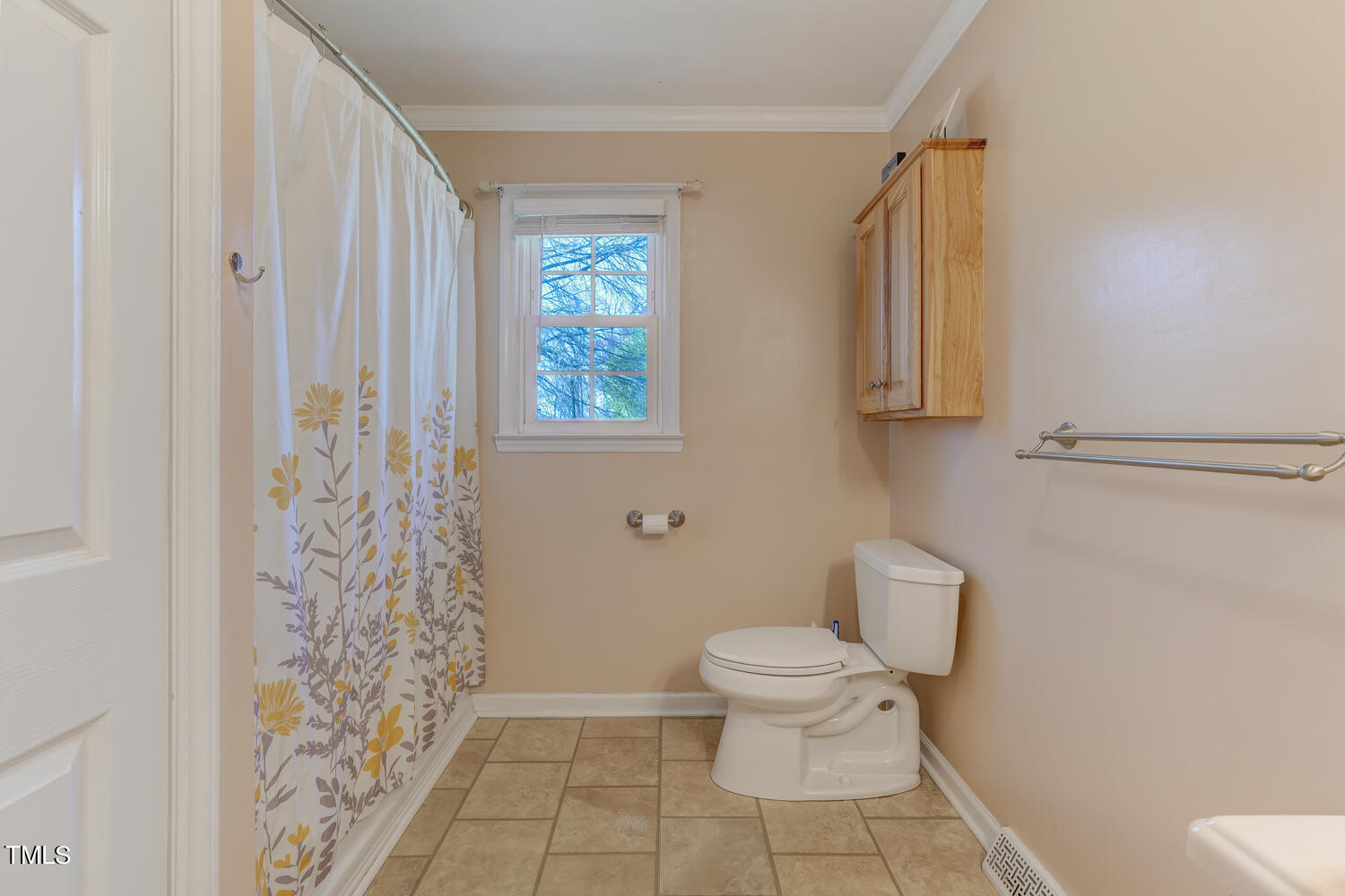 650 Huffines Mill Road Reidsville, NC 27320 - Photo 25 of 35 a bathroom with a toilet a sink and a window