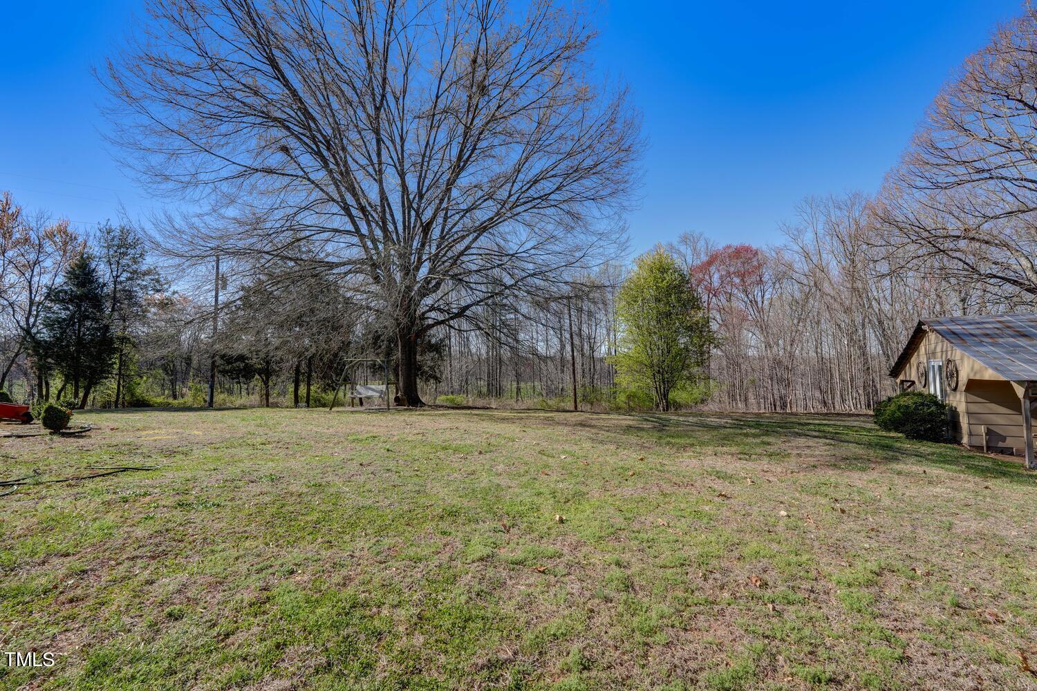 650 Huffines Mill Road Reidsville, NC 27320 - Photo 29 of 35 a view of a yard with a house