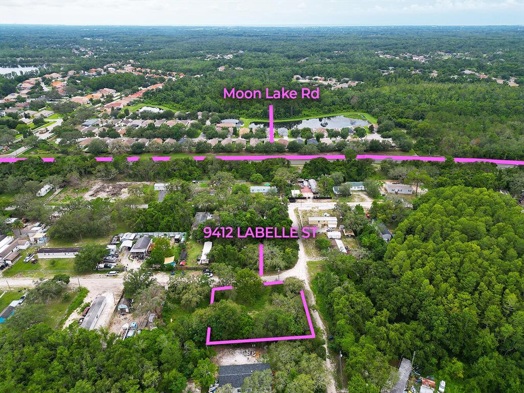 9412 Labelle Street New Port Richey, FL 34654 - Photo 2 of 3 a view of a city and mountains