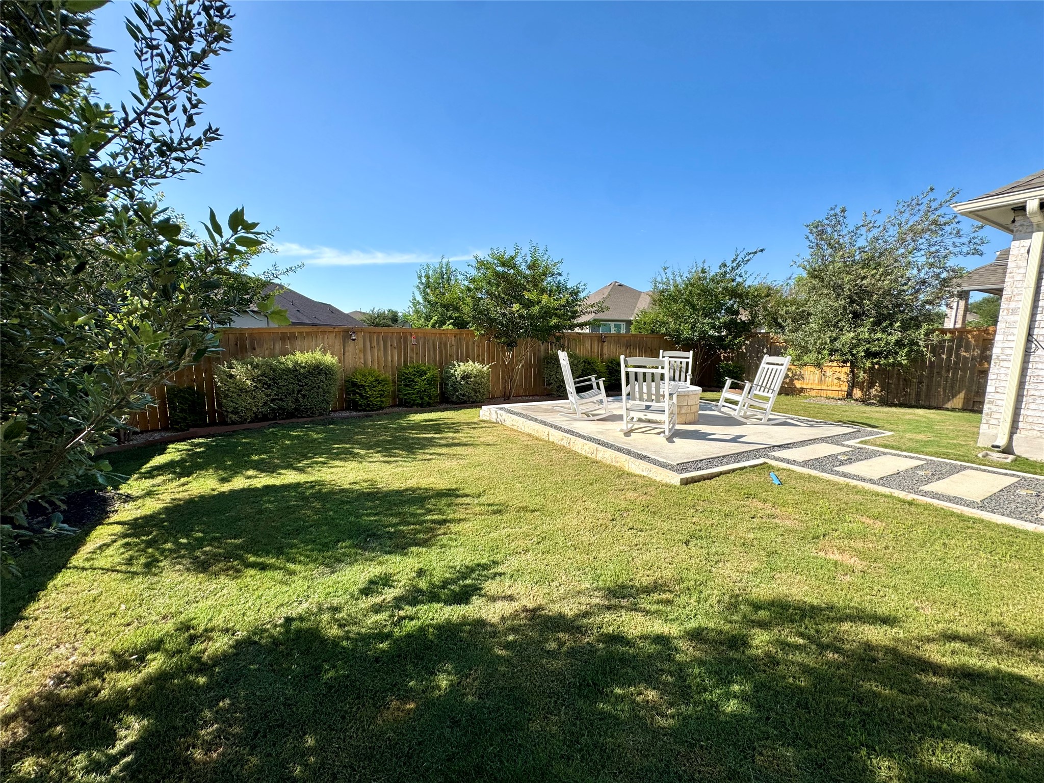 561 Cold Riv Run Kyle, TX 78640 - Photo 28 of 33 a view of swimming pool with a table and chairs