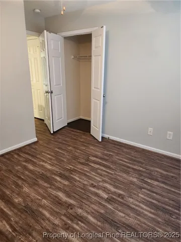 a bathroom with a bathtub and toilet