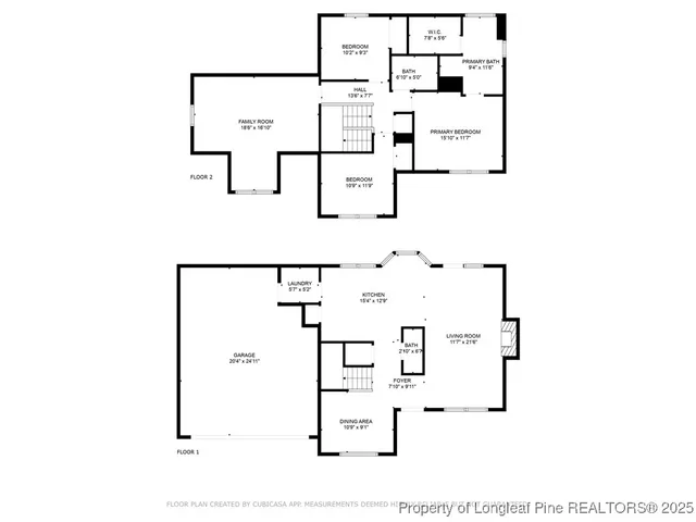 an empty room with wooden floor fireplace and windows