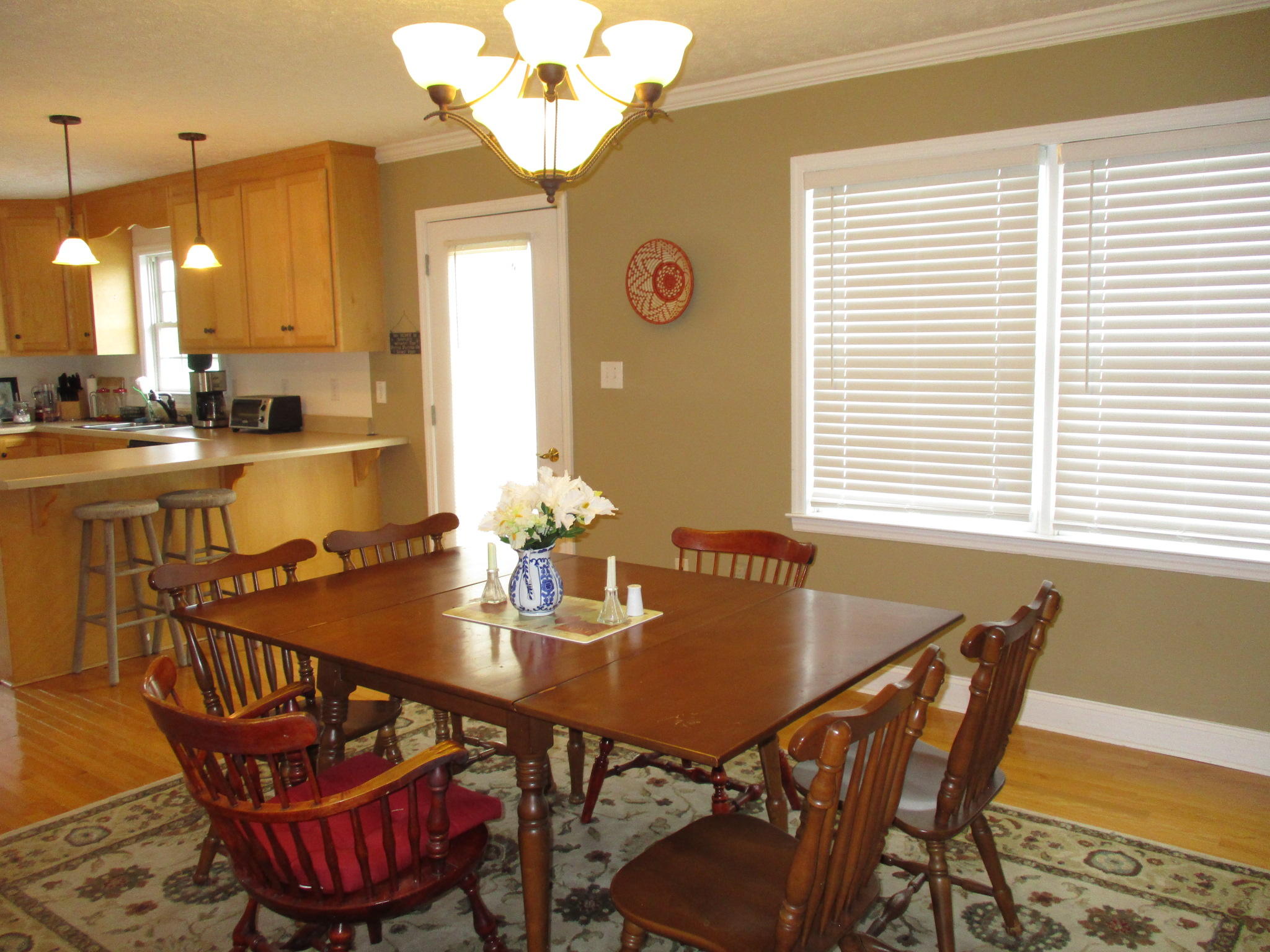 115 Marcom Drive Northwest Riner, VA 24149 - Photo 11 of 31 a view of a dining room with furniture and chandelier