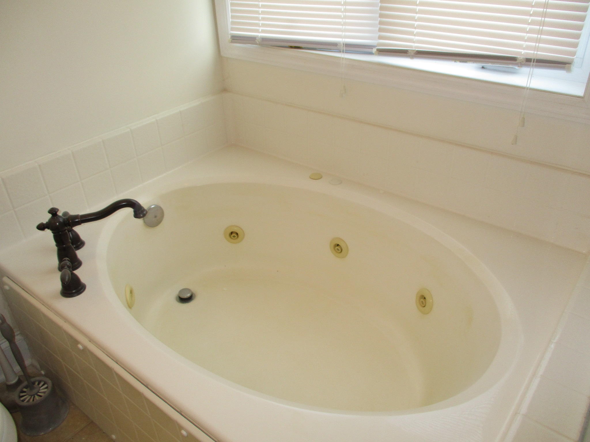 115 Marcom Drive Northwest Riner, VA 24149 - Photo 16 of 31 a bathroom with a tub