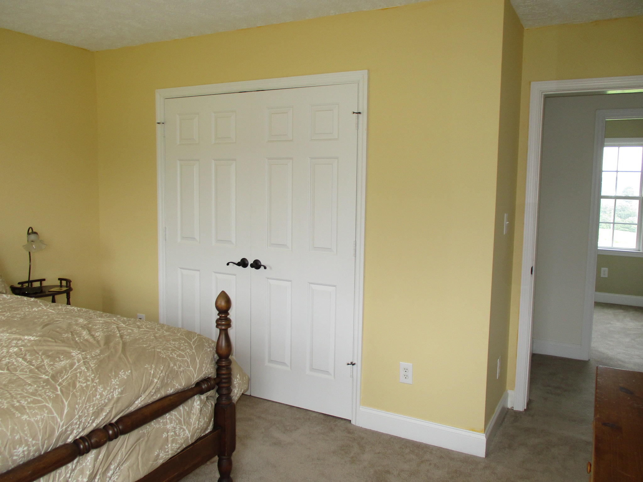 115 Marcom Drive Northwest Riner, VA 24149 - Photo 22 of 31 a bedroom with a bed and a window
