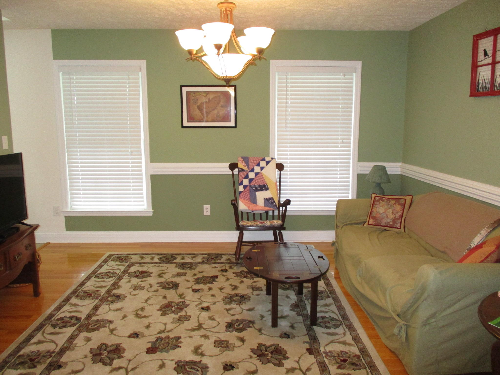 115 Marcom Drive Northwest Riner, VA 24149 - Photo 5 of 31 a living room with furniture and a flat screen tv