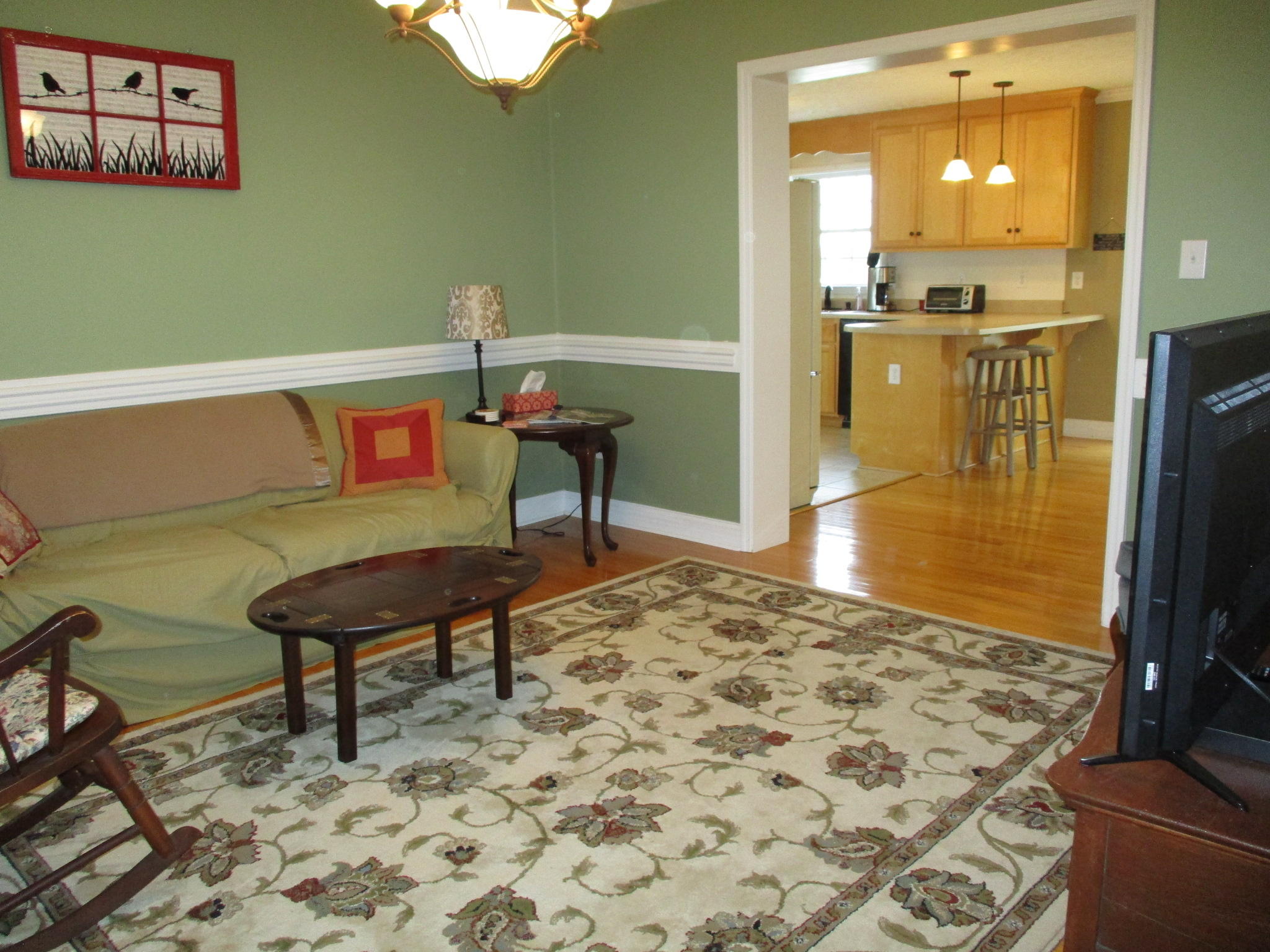 115 Marcom Drive Northwest Riner, VA 24149 - Photo 6 of 31 a living room with a couch and a table