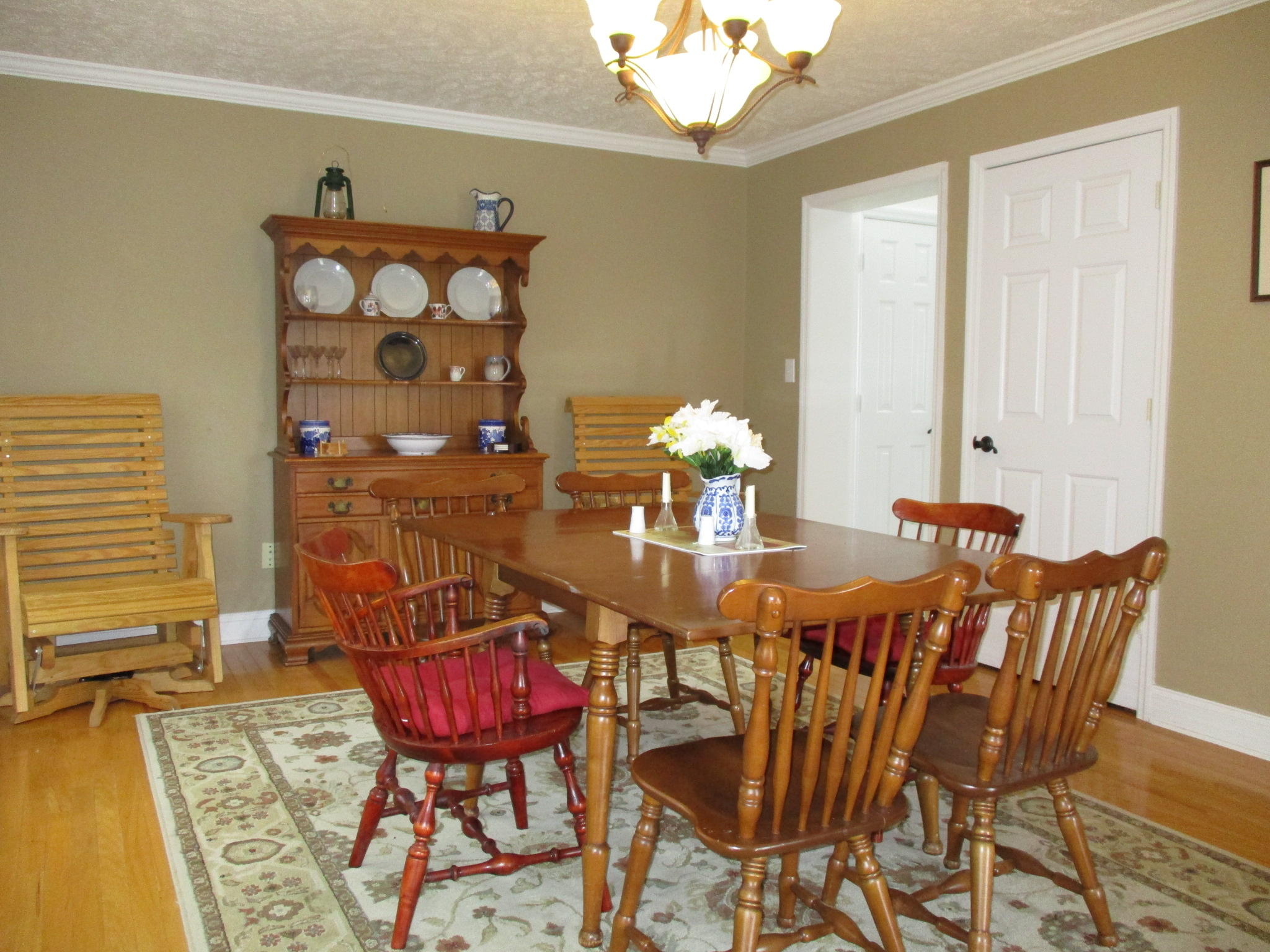 115 Marcom Drive Northwest Riner, VA 24149 - Photo 10 of 31 a view of a dining room with furniture and wooden floor