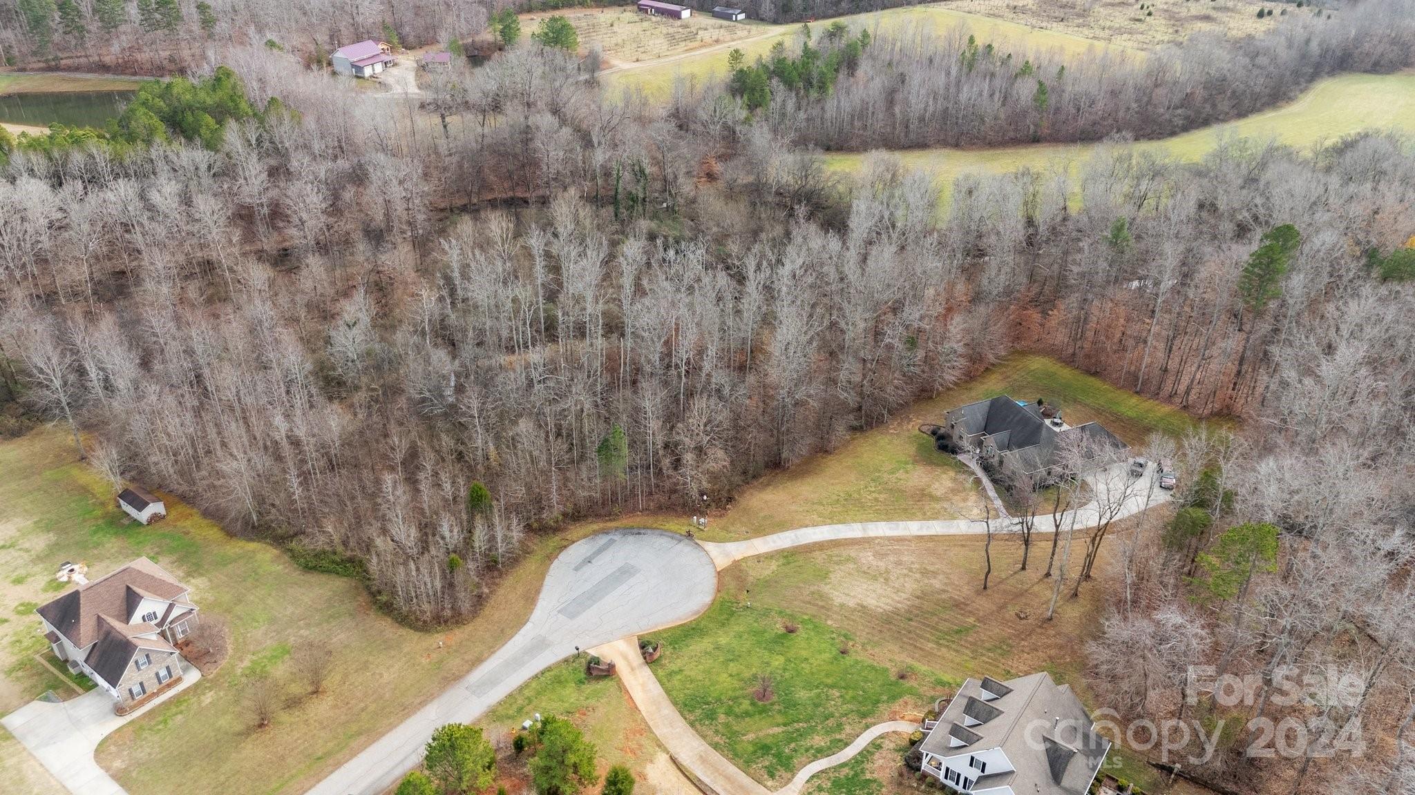 609 Copperfield Lane Lexington, NC 27292 - Photo 12 of 18 a picture of a bench in a backyard