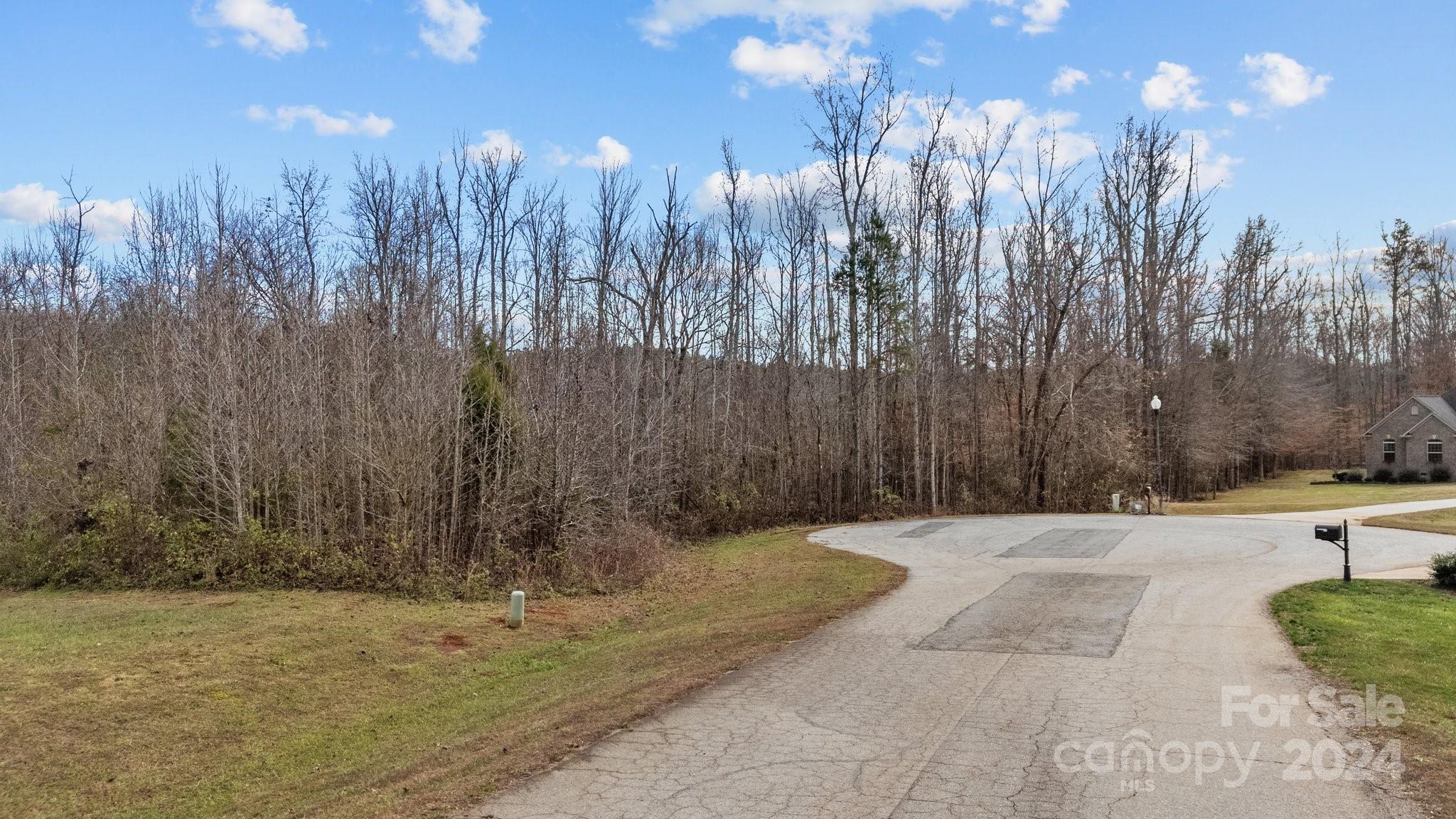 609 Copperfield Lane Lexington, NC 27292 - Photo 2 of 18 a view of a backyard of the house