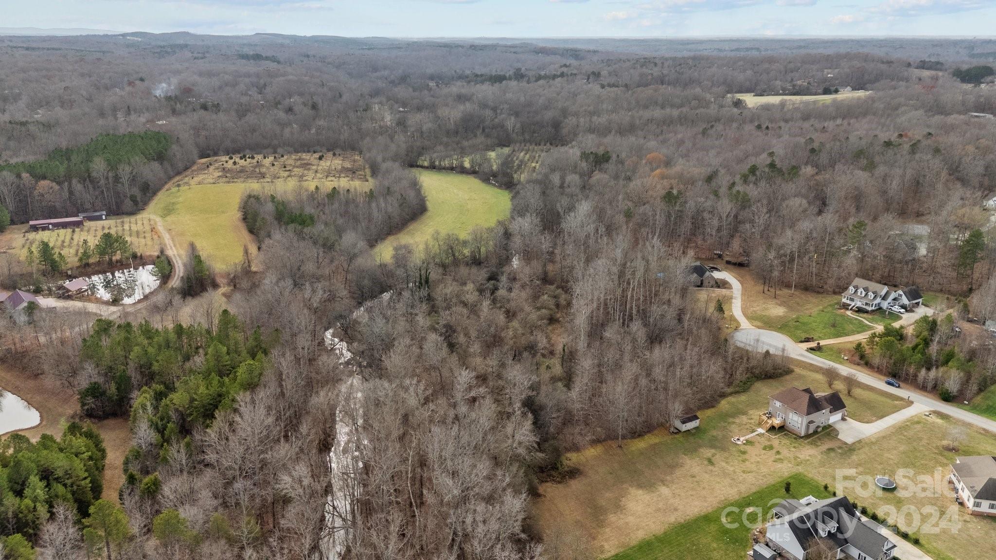 609 Copperfield Lane Lexington, NC 27292 - Photo 10 of 18 a view of a backyard of the house