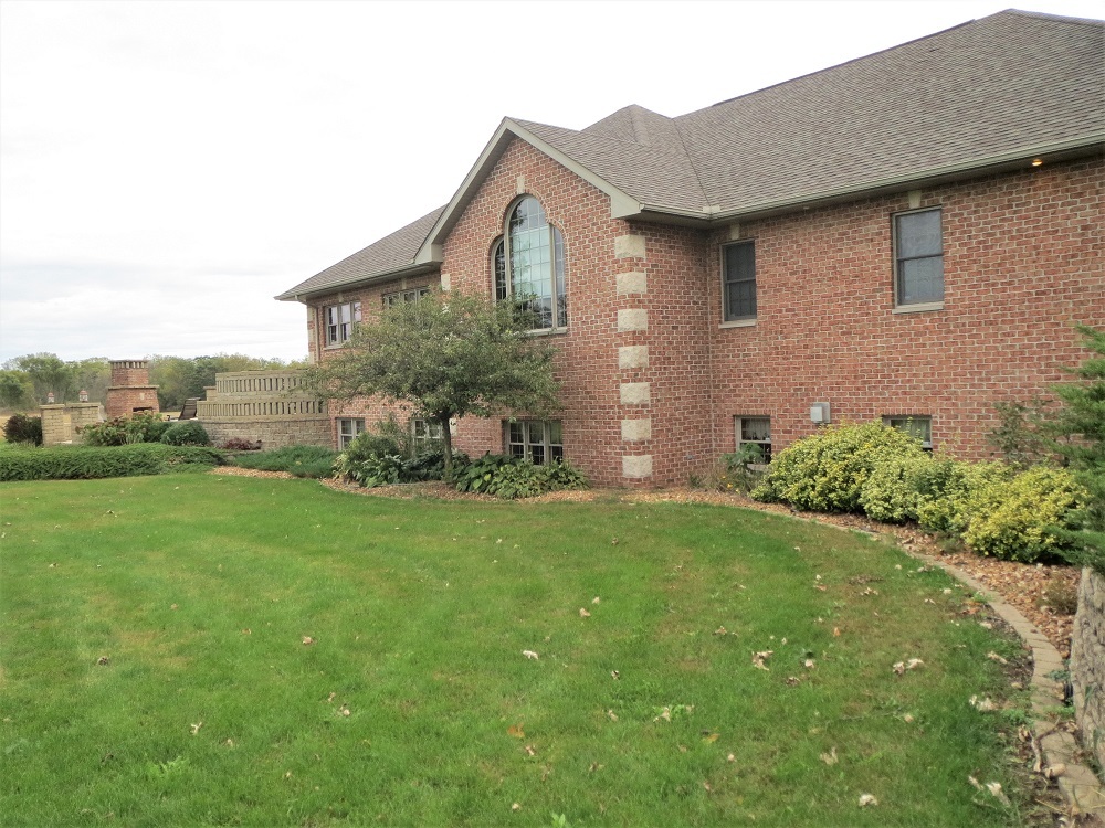 1122 Sterling Road Dixon, IL 61021 - Photo 2 of 45 a front view of a house with a yard