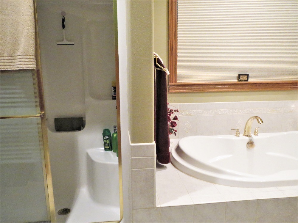 1122 Sterling Road Dixon, IL 61021 - Photo 12 of 45 a bathroom with a sink and a mirror