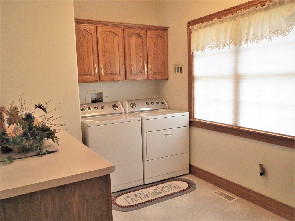 1122 Sterling Road Dixon, IL 61021 - Photo 17 of 45 a utility room with dryer and washer