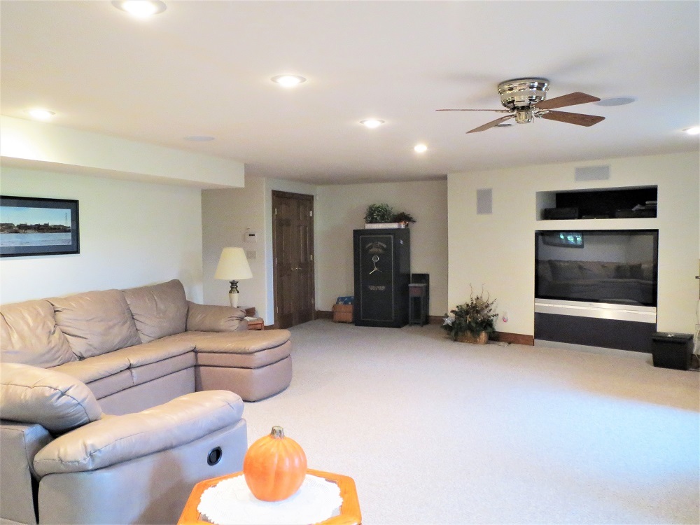 1122 Sterling Road Dixon, IL 61021 - Photo 22 of 45 a living room with furniture and a fireplace