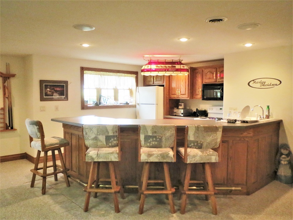 1122 Sterling Road Dixon, IL 61021 - Photo 25 of 45 a kitchen with granite countertop a table and chairs in it
